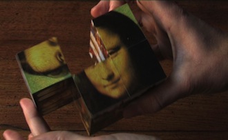 cube puzzle joconde et mains